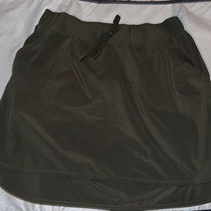 Dark green golf skort